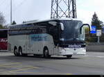Intertours - Mercedes Tourismo FR 300497 bei der zufahrt zu den Bus Haltestellen vor dem Flughafen in Genf am 24.03.2024
