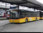 Postauto - MAN Lion`s City  AG 100556 beim Bhf.