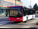 travys - MAN Lion`s City VD 486500 unterwegs vor dem Bahnhof in Yverdon am 2024.11.30