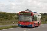 Ausnahmsweise war am 26. August 2009 der NF-SV 887 auf der Direktbuslinie 5 von List ber Westerland nach Hrnum unterwegs, als der Bus am Haus Hanna in Dnen zwischen Westerland und Rantum vorbei kommt.