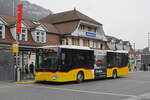 Mercedes Citaro der Post, auf der Linie 103, wartet am 30.03.2023 an der Haltestelle beim Bahnhof Interlaken Ost.