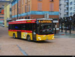 Postauto - MAN Lion`s City  TI 215334 in Bellinzona bei den Bushaltestellen beim Bahnhof am 12.02.2021