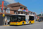 Mercedes Citaro der Post, auf der Linie 104, wartet am 05.08.2024 an der Haltestelle beim Bahnhof Interlaken Ost.