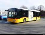 Postauto - Mercedes Citaro VD 615808 abgestellt auf einem Parkplatz beim Bahnhof in Yverdon am 2024.11.30