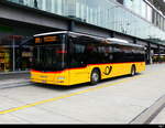 Postauto - MAN Lion`s City TG 103520 unterwegs vor dem Bhf.