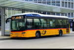 Postauto - Scania Citywide Hybrid  SG 80491 vor dem Bhf.